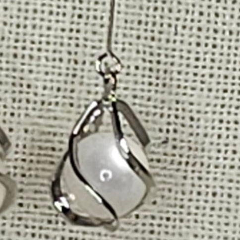 Silver bow drop earrings