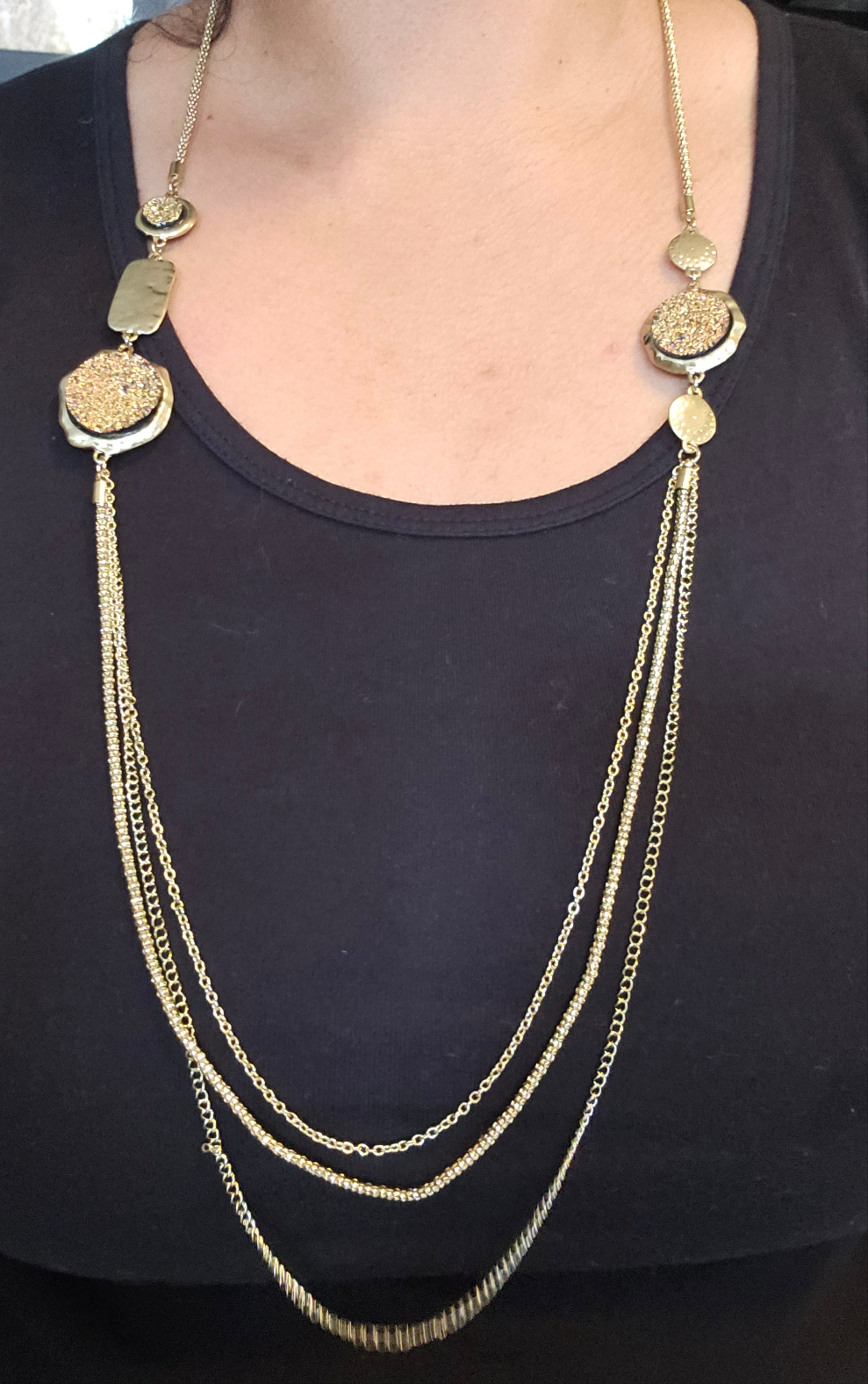 Long gold necklace